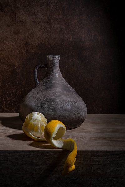 Classic still life with a bottle and lemon by John van de Gazelle fotografie