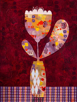 A stylised flower in a small vase on a chequered tablecloth