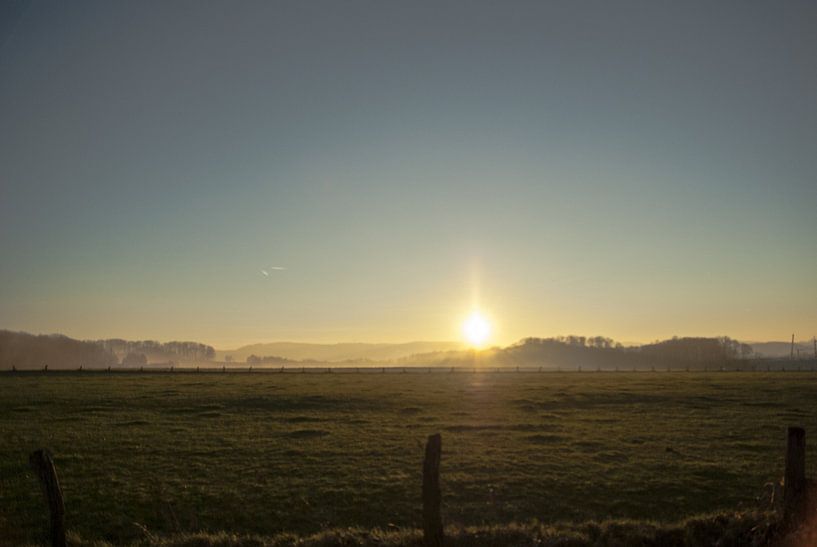 Zonsondergang g aan de rand van het Teutoburgerwoud van Norbert Sülzner