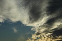 Mooie Hollandse wolken met zonsondergang