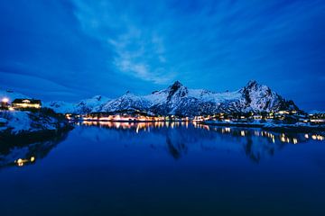 Svolvaer nighttime view over the town and snowy mountains