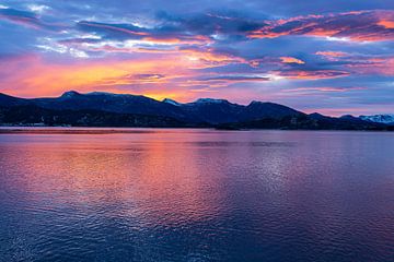 Mountains and rocks at sunrise near Torvik in Norway by Rico Ködder