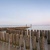 Breakwaters at sunrise in Breskens by Claire van Dun