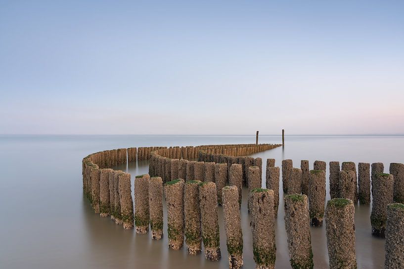 Breakwaters at sunrise in Breskens by Claire van Dun