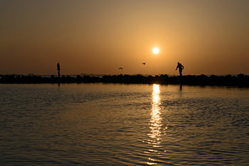 Sunset on the Grevelingen, walk over the breakwaters