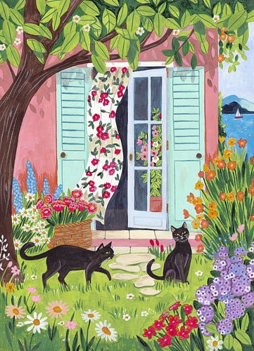Bloementuin met zwarte katten bij mediterrane woning