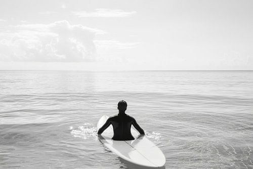 Surfers in kalm water