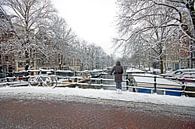 Das verschneite Amsterdam in den Niederlanden an einem Wintertag von Eye on You Miniaturansicht