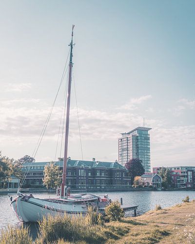 Moored sailboat on the Spaarne in Haarlem