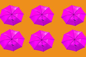 Pink umbrella's on orange background by Patricia Hofmeester