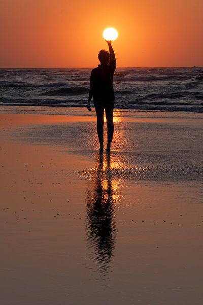 Zonsondergang in de handen van een vrouw van Wad of Wonders