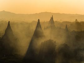 Sunset at temple field in Bagan, Myanmar by Shanti Hesse