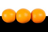 Oranges on white black background