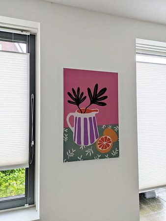 Pichet rayé avec feuilles et oranges