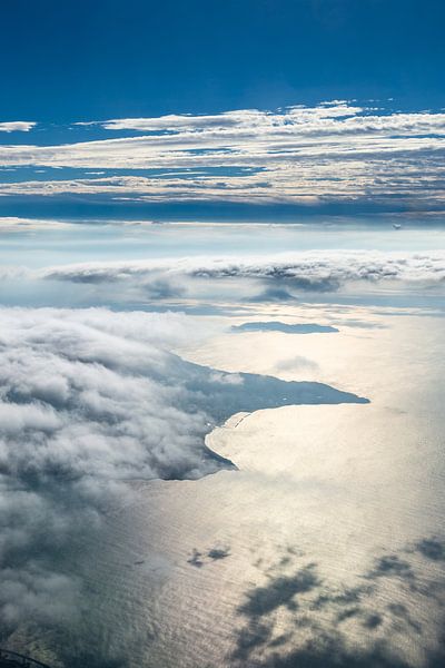 Clouds, land and sea by Inge van den Brande