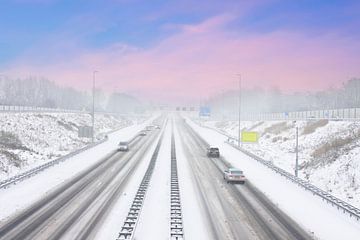 The A9 motorway in a winter snowstorm near Amsterdam Netherlands at sunset by Eye on You
