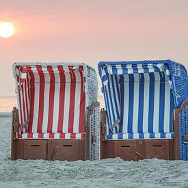Beach chairs in the sunset by the sea by ThomBal
