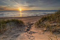 Path through the dunes leads to the beach where you can enjoy the setting sun.