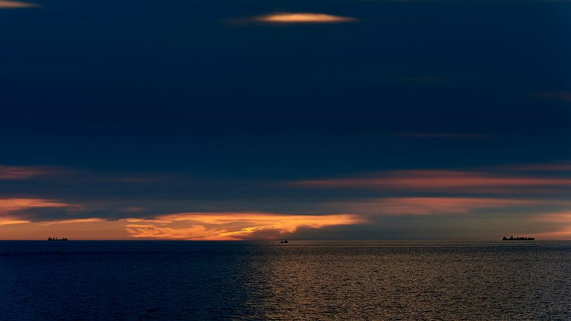 Three ships on the North Sea at sunset by Jenco van Zalk