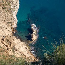 Cliffs and turquoise blue sea water by Adriana Mueller