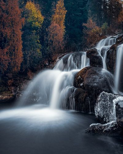 Waterfall with autumn colours by Leon Brouwer
