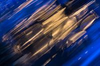 Abstract image of light in blue with orange