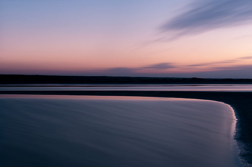 Sonnenuntergang in rosa und lila gekleidet