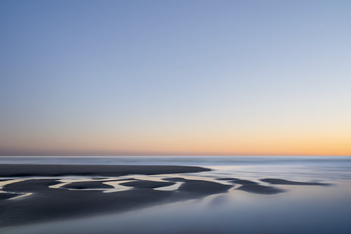 Sandbank im Licht des Sonnenuntergangs