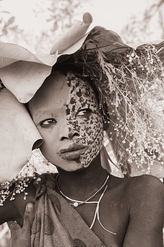 Un visage, deux mondes