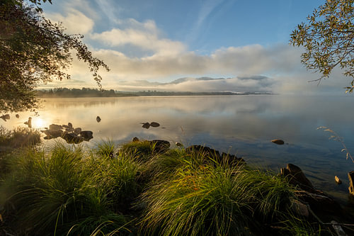 Lever du soleil sur le lac de Forggensee
