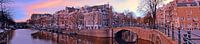 Panorama van de stad Amsterdam bij zonsondergang von Eye on You Miniaturansicht