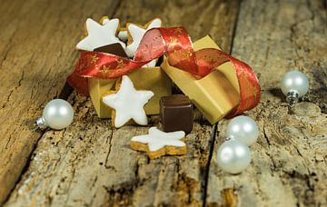Sweet Christmas present with star biscuits and chocolate by Alex Winter