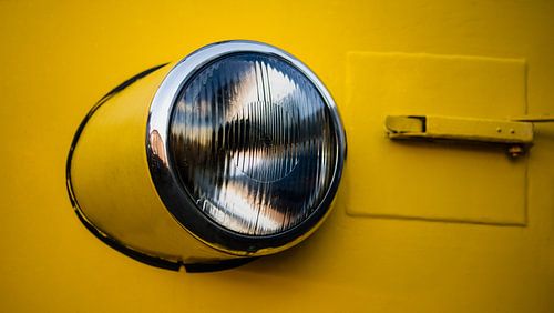 Train Headlight on Yellow – Industrial Detail Photography