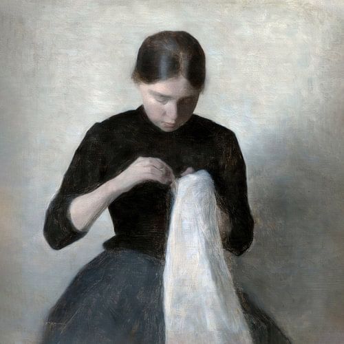 Young girl sewing