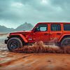 Red Jeep Wrangler at Sunset in the Dunes by robby akrim