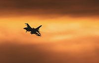 Moody sky for the F16 during the turn for landing