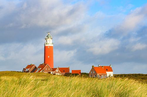 Texel lighthouse in the dunes during a stormy autumn morning