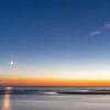 Moonset Katwijk aan Zee by Paul van der Zwan