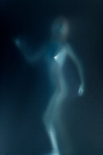 Female figure in blue