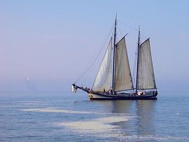 old sailing ship on the tidal flats by Gerda Scholten