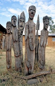 Wooden statues at the entrance of an Ethiopian tribe