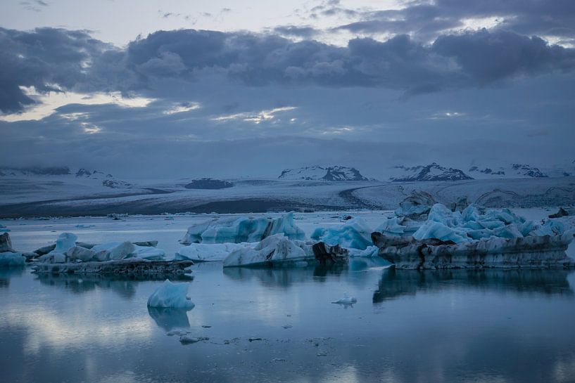 Iceland - Reflecting ice floes in glacier lagoon at glacier vatnajoekull by adventure-photos