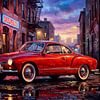 Volkswagen Karmann Ghia op een natte kasseienstraat van Jan Keteleer