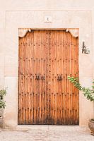 Weathered wooden door in Valldemossa, Mallorca