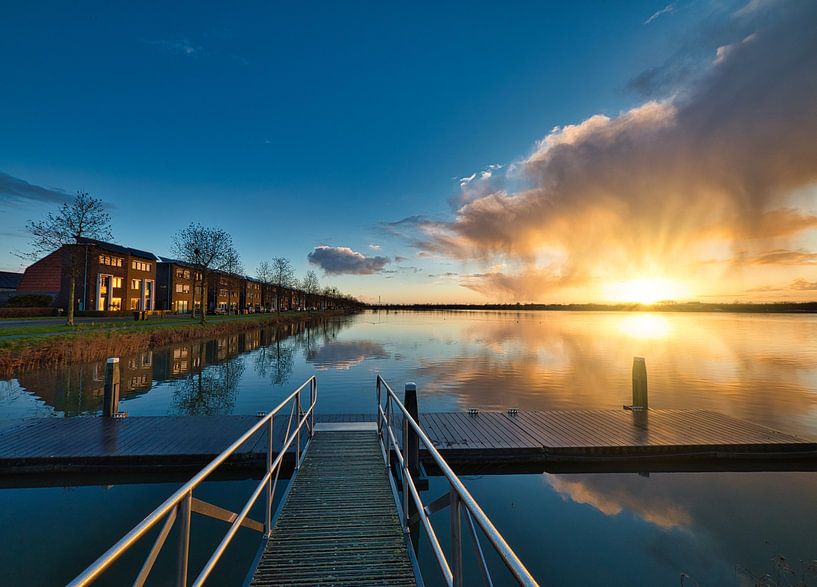Die Sonne sticht durch die Wolken von peterheinspictures