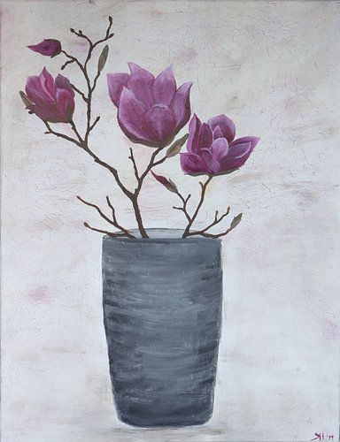 Magnolia takken in een vaas