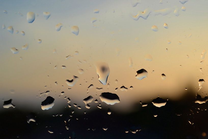 Raindrops on a window by Heiko Kueverling
