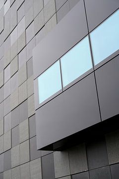 modern facade of an office building by Heiko Kueverling