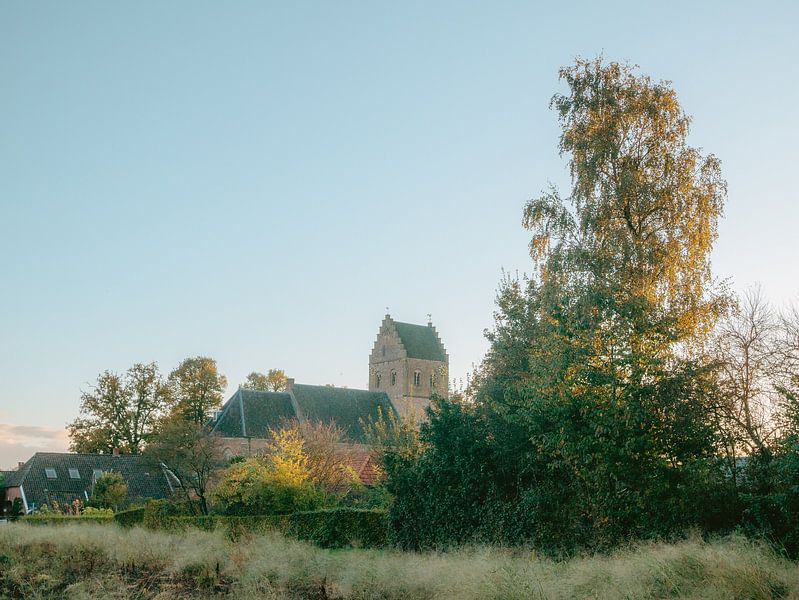 Church with stepped gable with sunset by Kay Wils