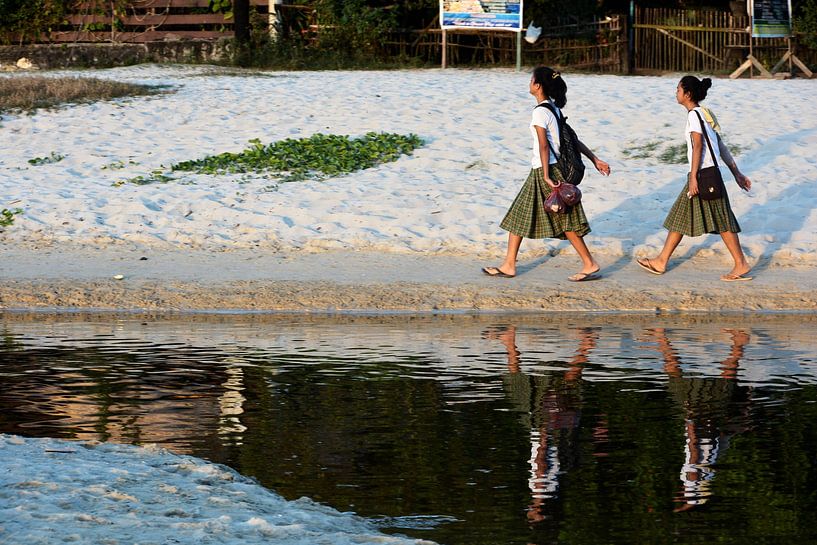 Two schoolgirls and their reflections by Frank Photos